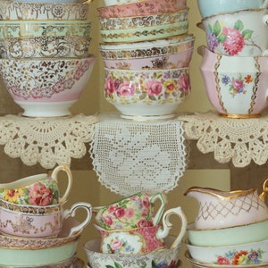 Vintage mismatched sugar bowls and creamers in a variety of sizes. Mostly floral patterns in pastel colors with gold or silver trim. Fancy china dishes used for parties and entertaining.