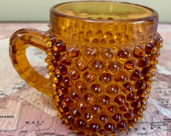 ANTIQUE | EAPG Amber All-Over Hobnail Glass Handled Mug Notched Handle 3 1/4” Tall 2.5” D