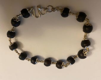 Ebony Wood Bead Bracelet: Karungali Beads with Silver Capping
