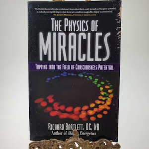 The Physics of Miracles Tapping Into The Field of Consciousness Potential Softcover Book by Richard Bartlett DC ND published by Simon Schust