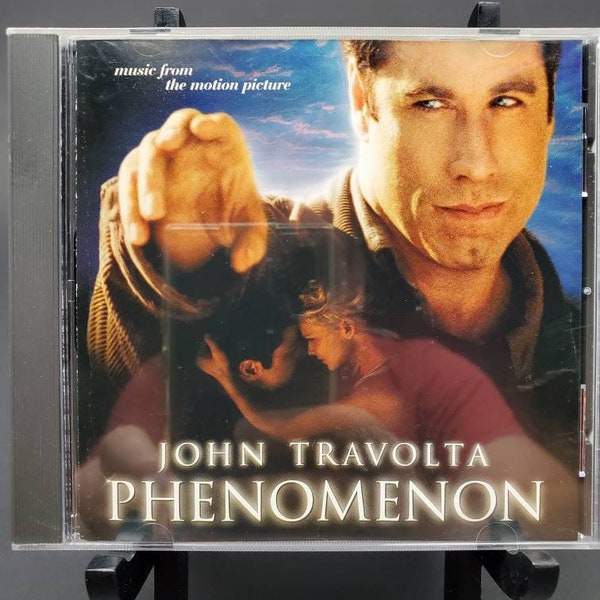 1996 Phenomenon Music from the Motion Picture Compact Disc John Travolta 9 46360 2 Reprise CD D114201