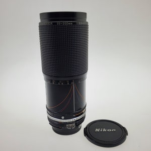 1990s Zoom Nikkor 35 - 200mm 1:3.5 - 4.5 Nikon Camera Lens 202450