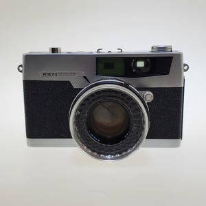 1973 Petri 7 S Circle-Eye System 35mm Film Camera 1.8 45mm Amber C with Leather Case