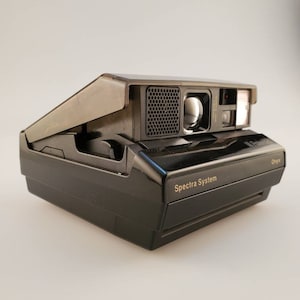 Polaroid ONYX, Polaroid ONYX Folding Flash Cam, See-thru Polaroid, See-through Polaroid, Prison Polaroid, Polaroid Instant Camera