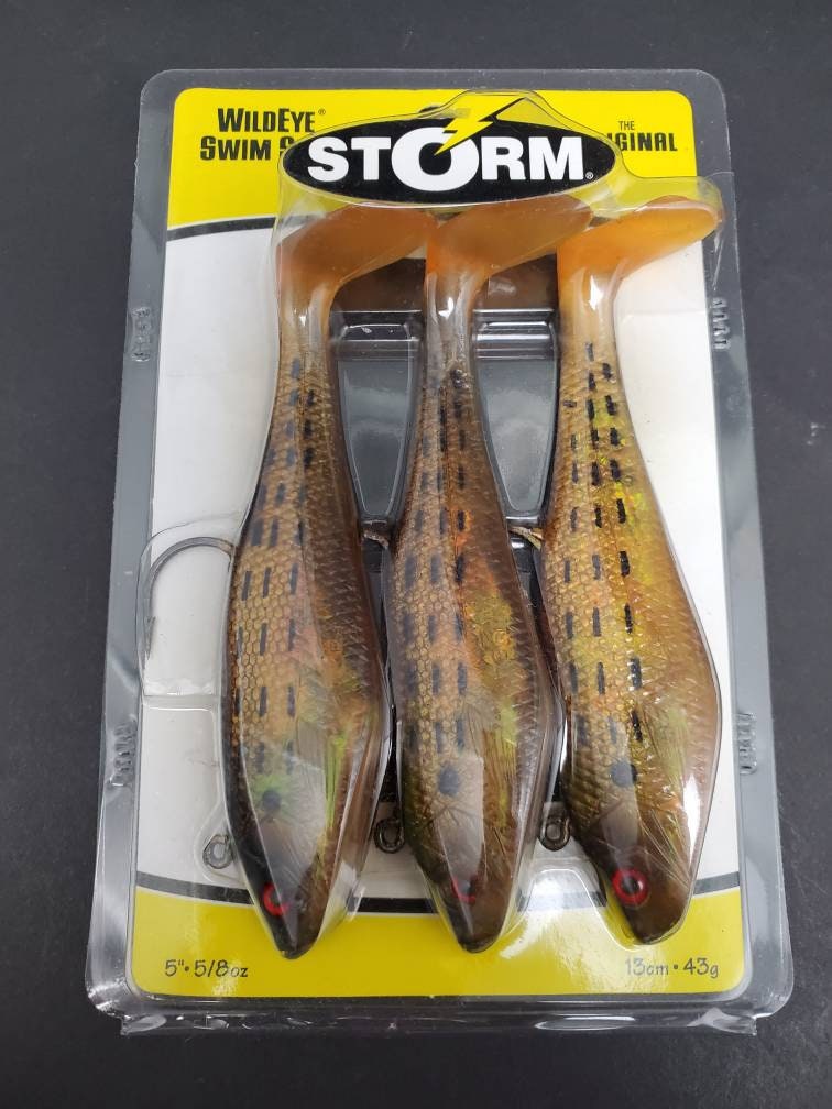 3 5 5/8 ounce Storm Wildeye Swim Shad Bunker Paddle Tail Hooked WSS05BNK  ISBN 0 39984 91586 4