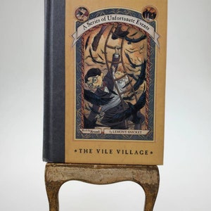 2001 The Vile Village A Series of Unfortunate Events Hardcover Book by Lemony Snicket Book the Seventh First Edition Harper Collins Publishe