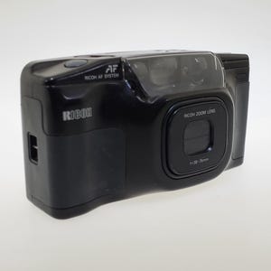 1989 Ricoh Shotmaster Zoom AF System Ricoh Zoom Lens f = 38 - 76mm 35mm Film Camera with Flash Point and Shoot Photography