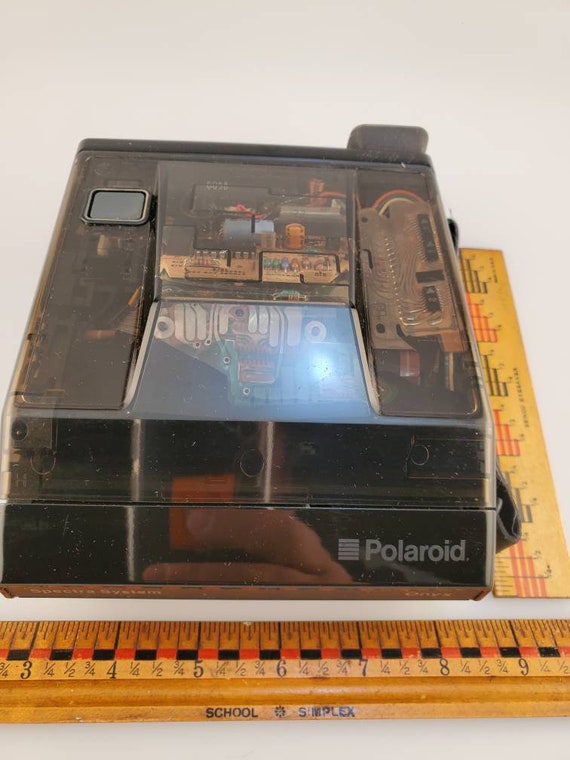 Polaroid ONYX, Polaroid ONYX Folding Flash Cam, See-thru Polaroid ONYX, Polaroid ONYX Folding Flash Cam, See-thru