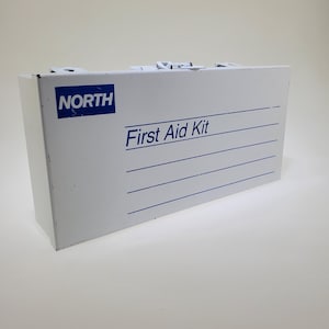 1980&#39;s empty North First Aid Kit