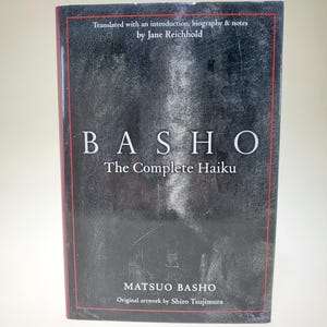 Basho The Complete Haiku Hardcover Book by Matsuo Basho translated by Jane Reichhold original artwork by Shiro Tsujimura published Kodansha