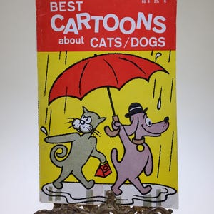 1958 Best Cartoons about Cats/Dogs Softcover Book edited by John Norment published by Rutledge Scholastic Books