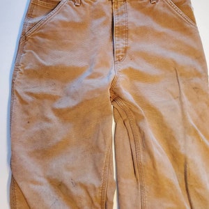 Pantalones de trabajo con aislamiento y forro de franela Carhartt de 33 x 36 para hombre, fabricados en EE. UU., década de 1990
