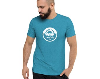 May include: A turquoise blue t-shirt with a white circle logo featuring a cartoon monster with the text "nessie co."