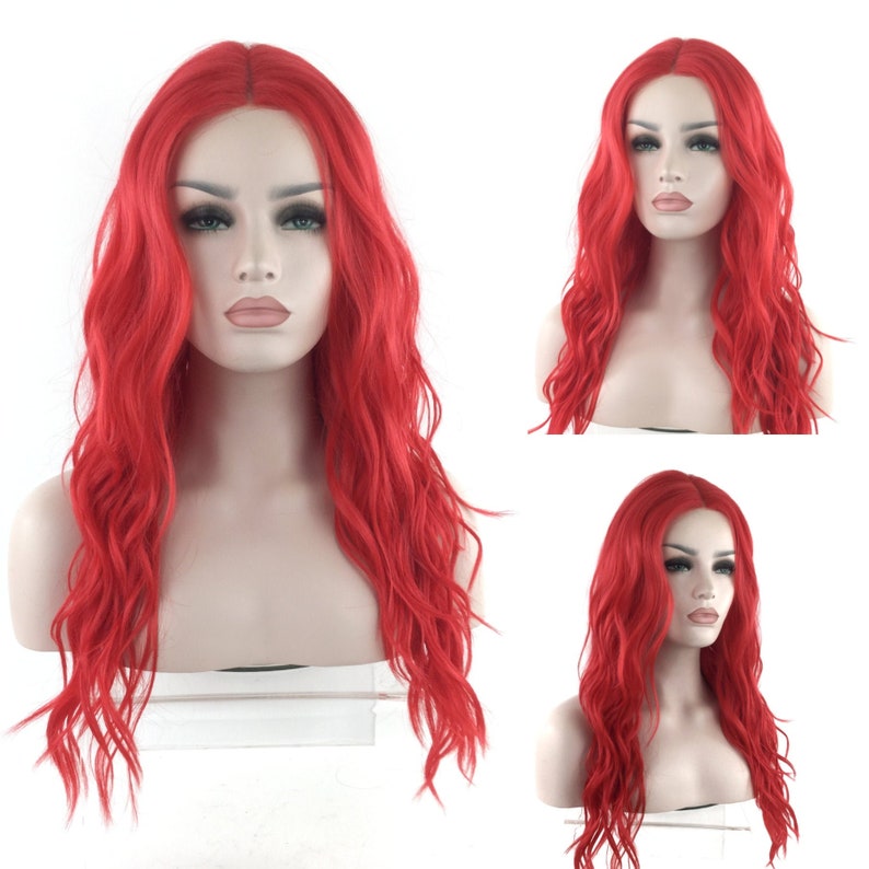 May include: A long, wavy, red wig with a lace front. The wig is styled in loose waves and falls to the shoulders.