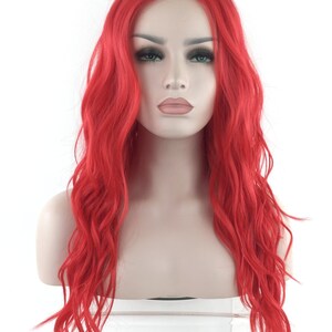 May include: A long, wavy, bright red wig with a lace front.