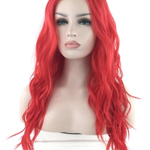 May include: A long, wavy, bright red wig with a lace front. The wig is styled in loose waves and falls to the shoulders.