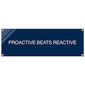 May include: A dark blue banner with silver rivets and a white diagonal stripe. The text "PROACTIVE BEATS REACTIVE" is printed in white on the banner.