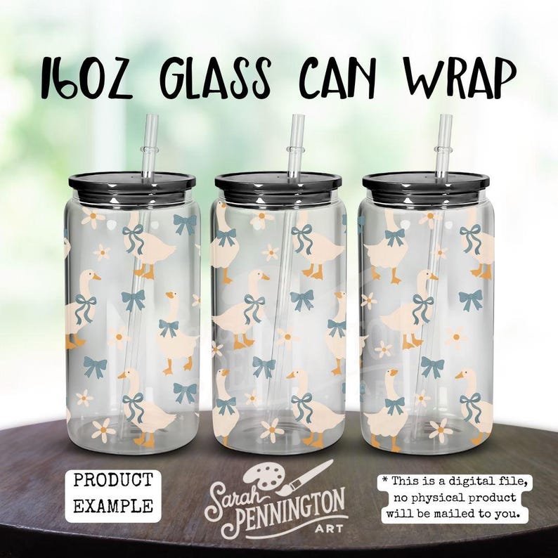 May include: Three clear 16oz glass can wraps with black lids and straws. The wraps feature a pattern of light orange geese with blue bows and white flowers. The text "16oz Glass Can Wrap" is at the top.