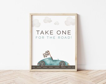 May include: A printable sign with a blue car and white clouds. The text on the sign reads "Take One For The Road!"