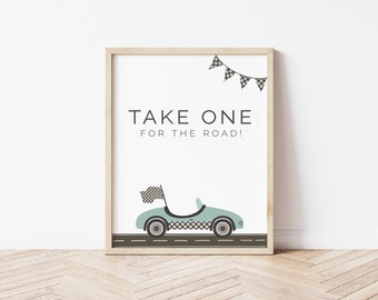 May include: A printable poster with a light blue race car driving on a black road. The poster has the text "TAKE ONE FOR THE ROAD!" and a checkered flag bunting at the top.