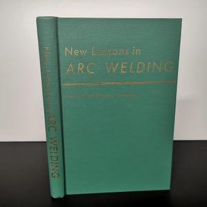 1960s New Lessons in Arc Welding Green HC Lincoln Electric Company Vintage Book Workshop Construction Trades Building Welder