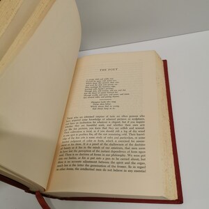 May include: A page from a book titled "The Poet" with a poem about a child who is wise and old. The poem is written in a traditional style with a focus on nature and the beauty of the world.