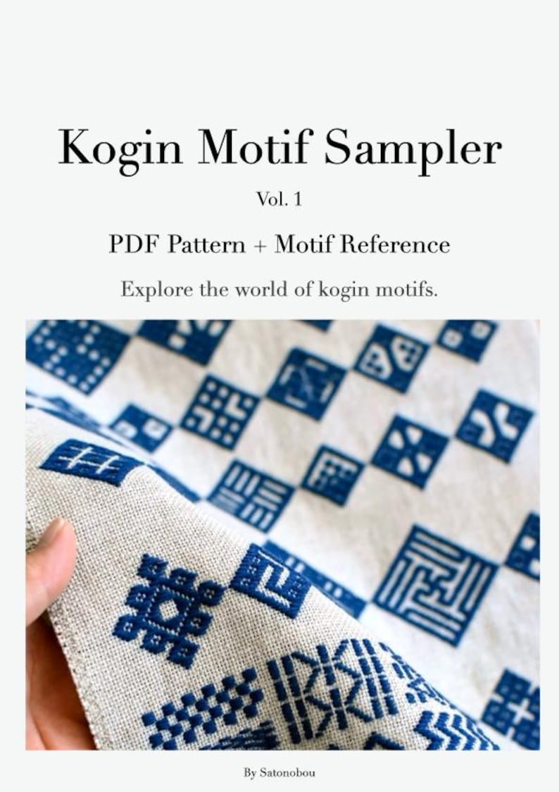 May include: A Kogin Motif Sampler Vol. 1 PDF Pattern + Motif Reference document featuring the text Explore the world of kogin motifs and By Satonobou. The image displays a light beige fabric with various blue geometric embroidered patterns.