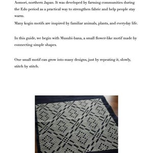 May include: A square piece of dark blue fabric featuring white Kogin counted embroidery. The textile displays a repeating geometric pattern of interconnected diamond and cross shapes, creating a symmetrical, intricate design across the surface.