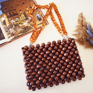 Natural wooden beaded chain handle bag