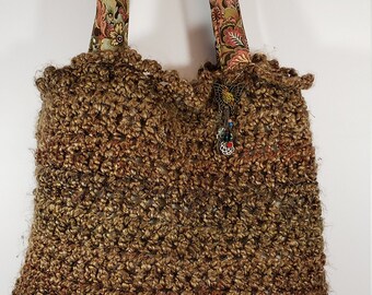 Tote for the warm and fuzzy side of you.  13 inch Brown Knitted, Lined has Pockets and Butterfly Charm