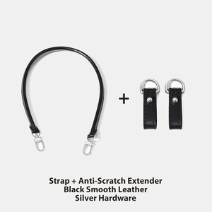 May include: A black smooth leather bag strap with silver hardware and two matching anti-scratch extenders. The strap is curved and has a silver clasp on each end. The text on the image reads: Strap + Anti-Scratch Extender, Black Smooth Leather, Silver Hardware.