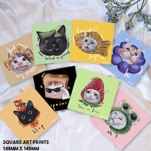 Puede incluir: Conjunto de 10 impresiones de arte cuadradas con ilustraciones de gatos con diferentes expresiones y accesorios. Las impresiones son sobre fondo blanco con fondo rosa claro, azul claro, verde claro, amarillo y negro. Las impresiones miden 148 mm x 148 mm.