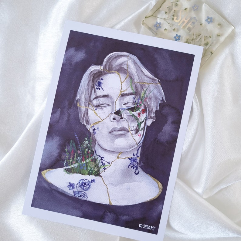 May include: A watercolor painting of a person's face with cracks and gold accents. Flowers and leaves grow from the cracks in the face. The background is a dark purple.
