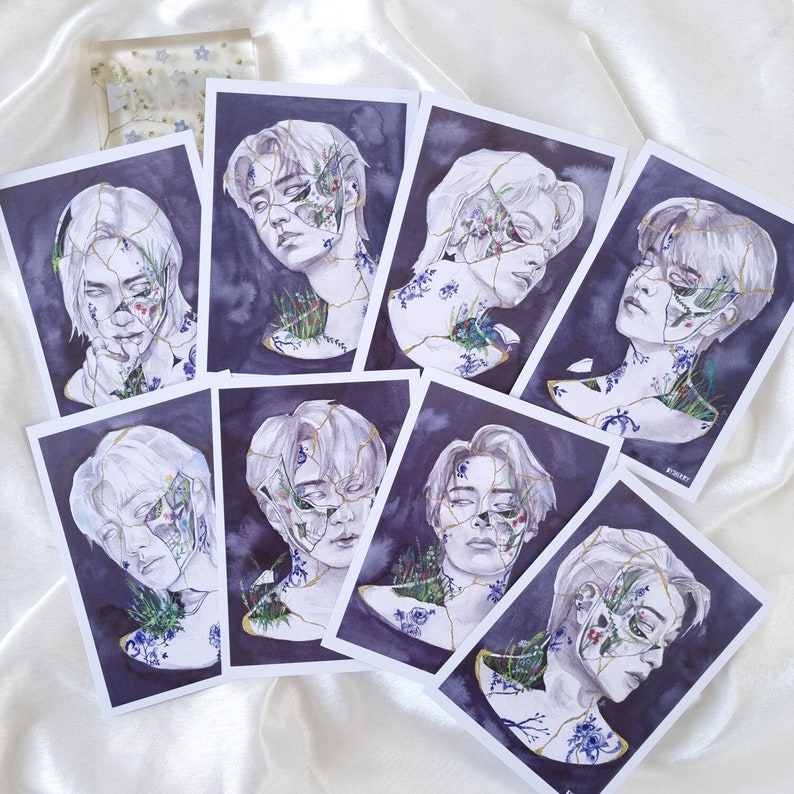 May include: Set of 8 watercolor illustrations featuring portraits of people with floral and botanical elements. Each portrait is framed with a broken, cracked, and chipped porcelain design. The illustrations are painted in shades of blue, purple, green, and white.