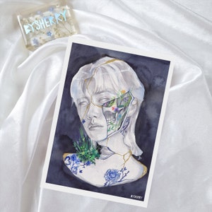 May include: Watercolor painting of a person's face with cracks and flowers growing from the cracks. The person's face is white and the flowers are blue, pink, and yellow. The background is dark blue.