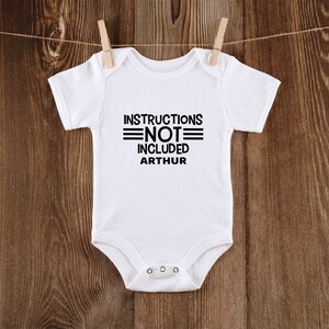 Funny Instruction Not Included Custom Baby Name Onesie® Personalized Baby Name Onesie® Baby Sayings® Newborn Baby Onesie® Baby Shower Gift