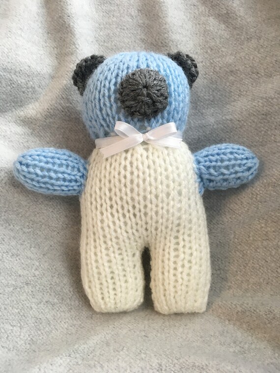 white and blue teddy bear
