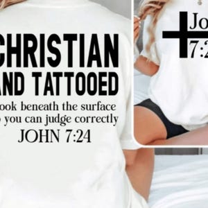 May include: White t-shirt with black text that reads "Christian and Tattooed" and "Look beneath the surface so you can judge correctly John 7:24". The back of the shirt has a black cross with the text "John 7:24".