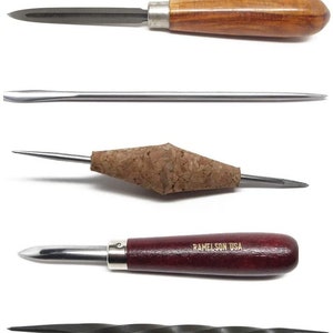May include: Set of five leather crafting tools, including a wood-handled scraper, a long metal awl, a cork-handled awl, a red-handled scraper, and a twisted metal awl.