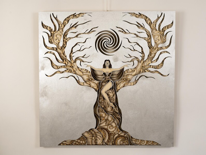 Decorative mandala piece highlighting the energetic essence of the divine feminine in richly textured wood