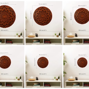 May include: Six different sizes of wooden wall decor with a brown mandala design. The decor is shown on a white wall with a shelf underneath. The shelf is decorated with a small plant, a book, and a decorative object.