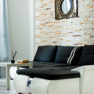 Elegant mirror mandala wall decor with a harmonious blend of bold shapes and reflective surfaces, elevating any modern space