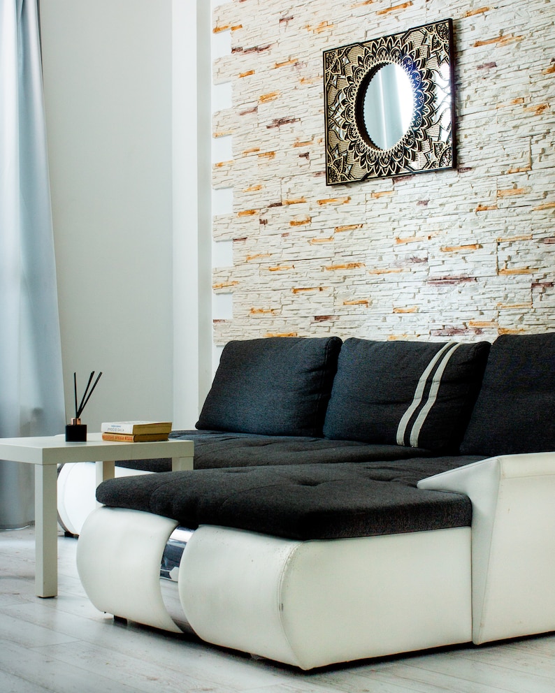 Elegant mirror mandala wall decor with a harmonious blend of bold shapes and reflective surfaces, elevating any modern space