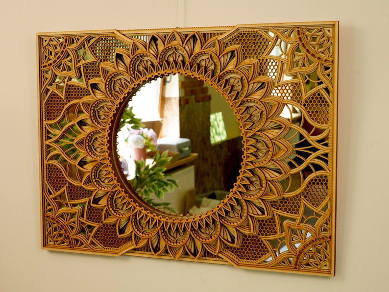 Large circular mirror mandala showcasing subtle etched details, creating a stylish focal point in a modern home