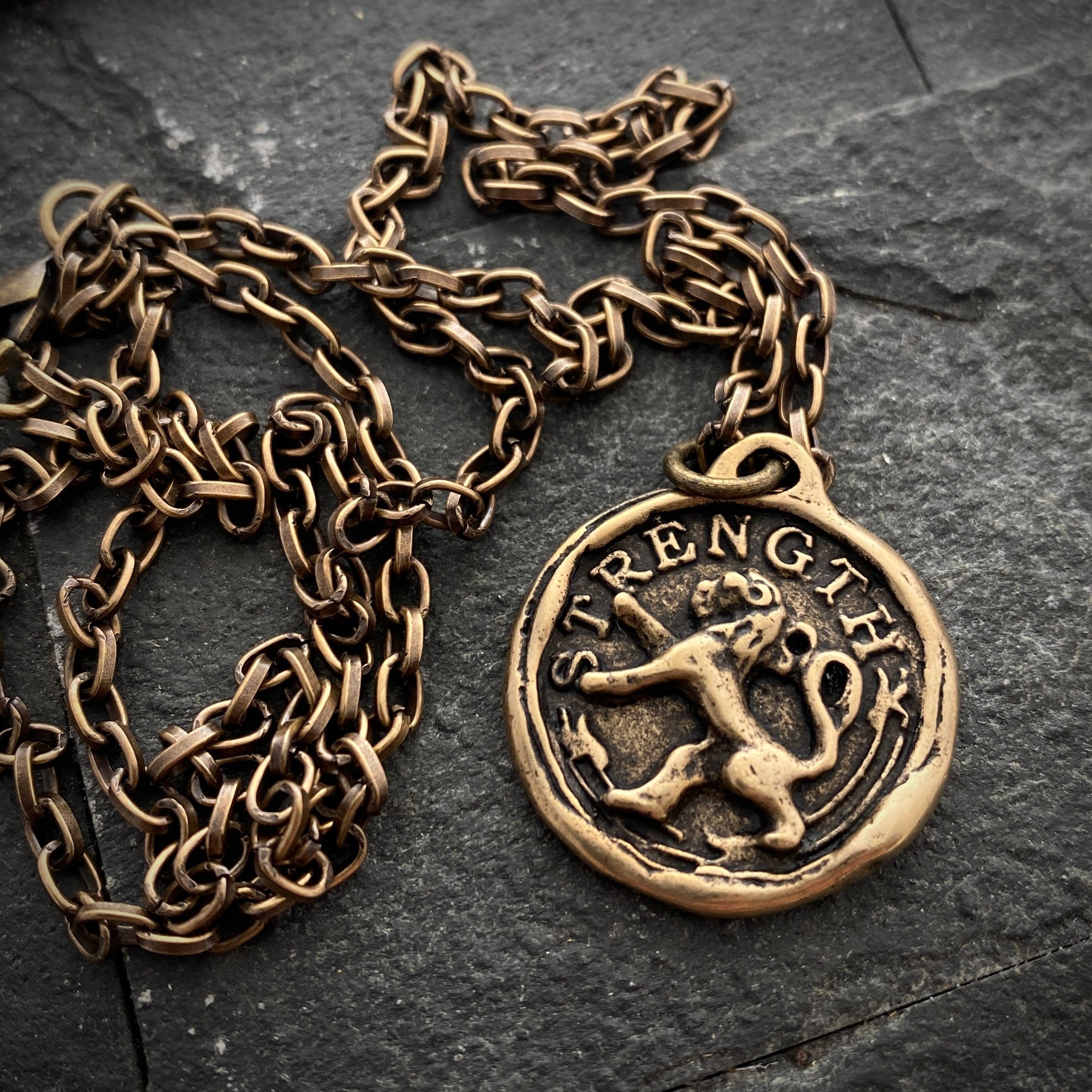 Mens pendants outlet with meanings
