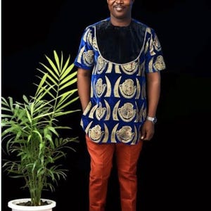 Igbo traditional dress, igbo isi agu, igbo men outfits. Igbo men Wedding dress with matching pants