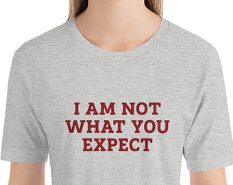 I Am Not What You Expect — Premium Short-Sleeve Unisex T-Shirt