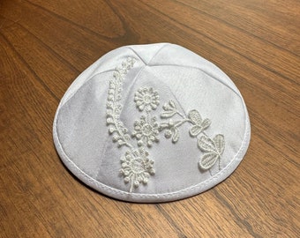 White silk kippah with flower embellishments