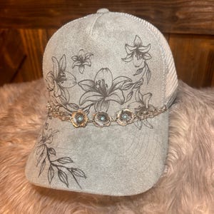 Custom hand burned Hawaiian flower  design on suede SnapBack ball cap