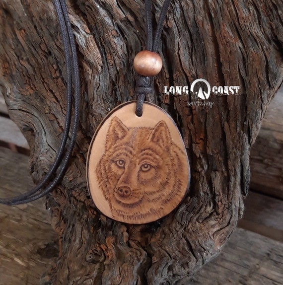 Carved wolf best sale pendant
